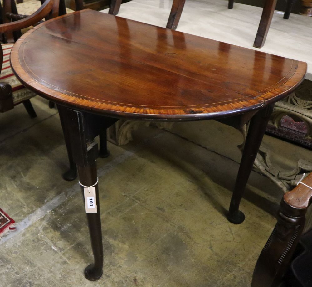 A George II satinwood banded mahogany pad foot drop leaf table, 90cm extended, width 94cm, height 70cm